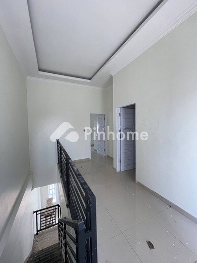 dijual rumah 2 lantai 3kt 60m2 di jl  pertahanan  kel  timbang deli  kec  medan amplas  kota medan  sumatera utara  20148 - 12